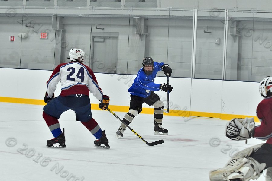 Wheaton College Men\'s Ice Hockey vs Middlesex Community College. - Photo By: KEITH NORDSTROM